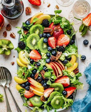 healthy-veggie-fruit-salad-flat-lay-topped-with-blueberries